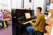 Andrew at the piano in Freshbrook